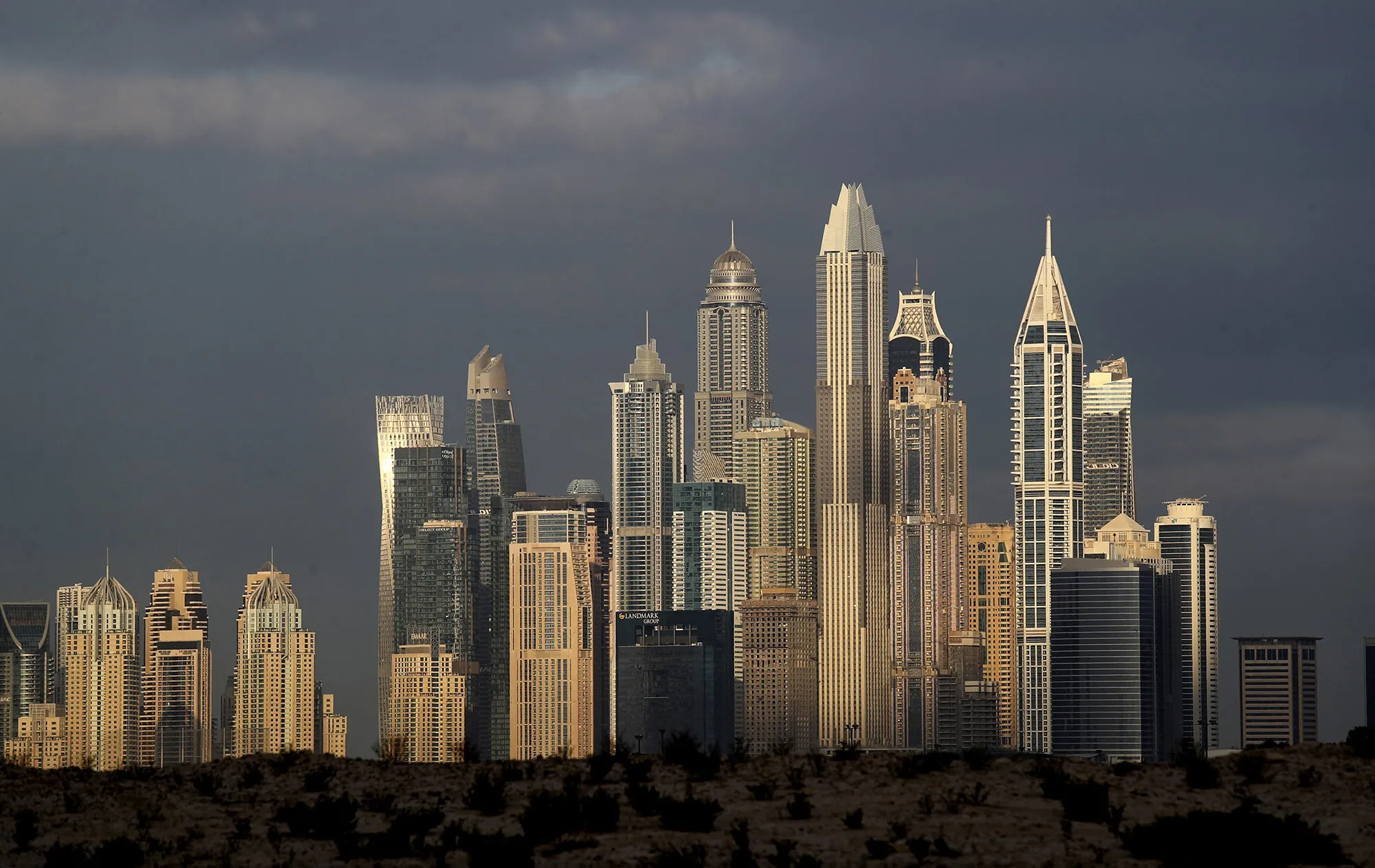 The sun reflects on skyscrapers in Dubai, United Arab Emirates.
