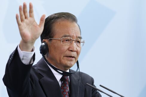 Wen Says World Must Cut Debt, Stem Euro Crisis as Pressure G