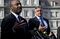 Ken Frazier, chairman and chief executive officer of Merck & Co., left, speaks as Robert Bradway, president and chief executive officer of Amgen Inc., center, and Joaquin Duato, executive vice president and worldwide chairman of pharmaceuticals at Johnson & Johnson, listen during a news conference outside the White House following a meeting with U.S. President Donald Trump, not pictured, in Washington, D.C., U.S., on Tuesday, Jan. 31, 2017. Trump told drugmakers they were charging astronomical prices and promised to get better bargains for government health programs, in addition to finding ways to get new medicines to market faster. Photographer: Andrew Harrer/Bloomberg