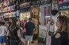Pedestrians gather near a gold and currency exchange store at the Grand Bazaar in Istanbul, Turkey, on Friday, Aug. 17, 2018. Turkish President Recep Tayyip Erdogan argued citizens should buy gold, then he said sell. Add dramatic swings in the lira, and the country’s traders are now enthusiastically doing both.