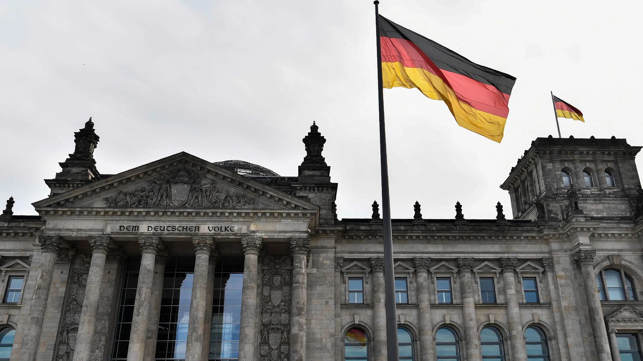 View of the Reichstag building which houses the Bundestag Lower House of parliament in Berlin taken on September 23, 2017. Germany goes to the polls for parliamentary elections on September 24, 2017. / AFP PHOTO / John MACDOUGALL (Photo credit should read JOHN MACDOUGALL/AFP/Getty Images)
