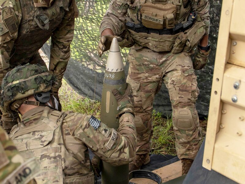 An M982A1 Excalibur round being loaded into a howitzer during US Army training in 2020.