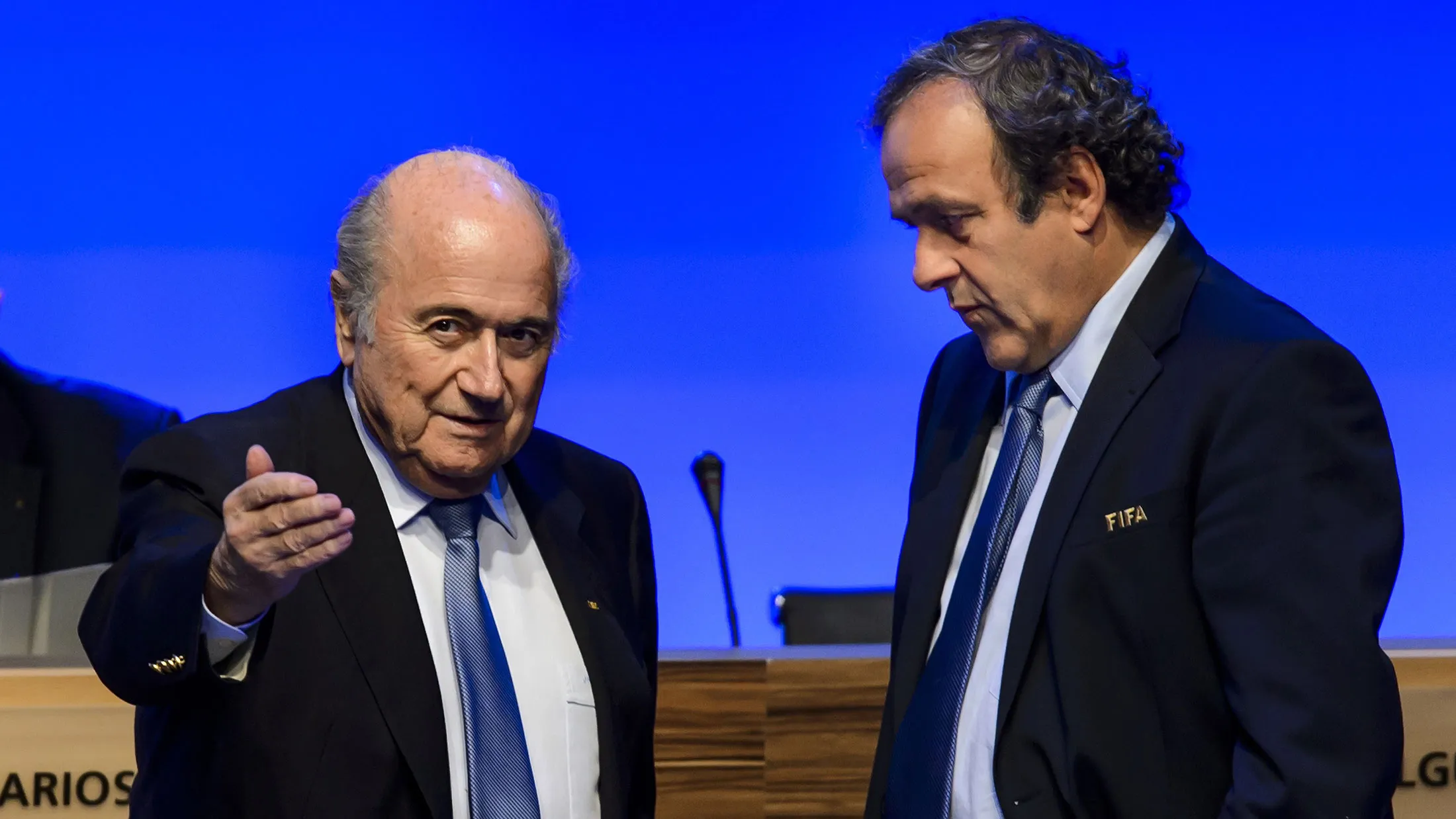 Joseph Blatter, left, talks to UEFA president Michel Platini during the 64th FIFA congress on June 11, 2014 in Sao Paulo.
