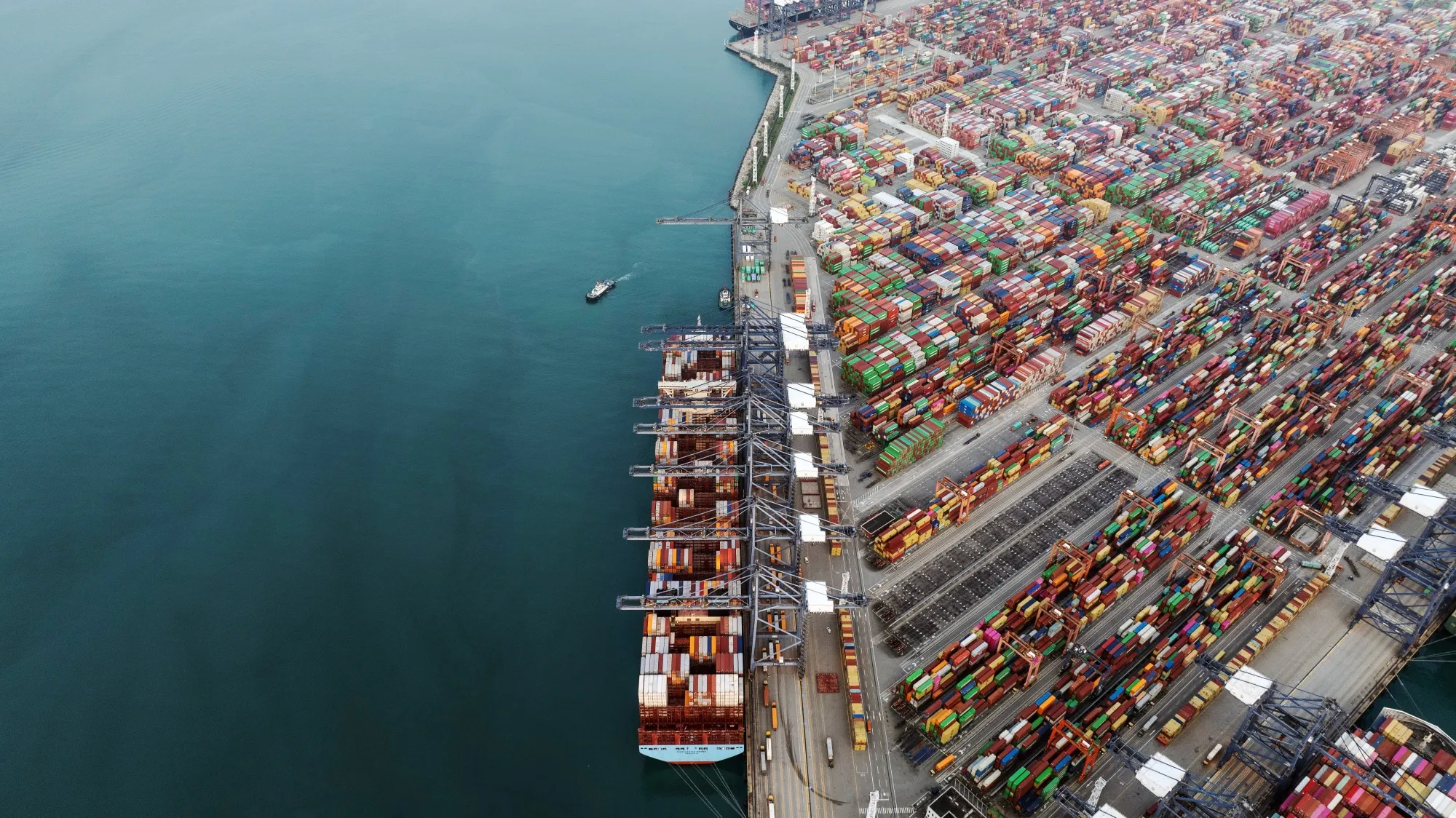 Gantry cranes and shipping containers at the Yantian International Container Terminals in Shenzhen, China