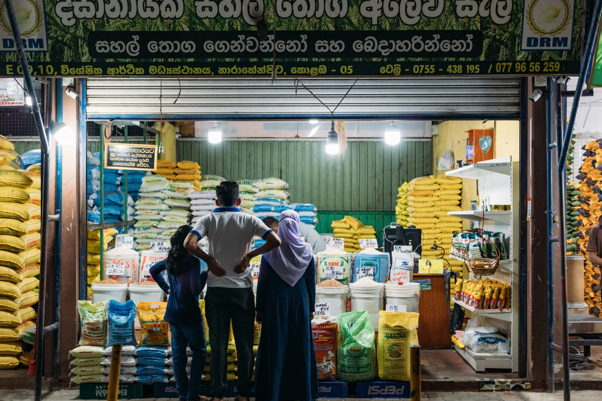 Shoppers at a grains stall at the Narahenpita Economic Centre in Colombo, Sri Lanka.