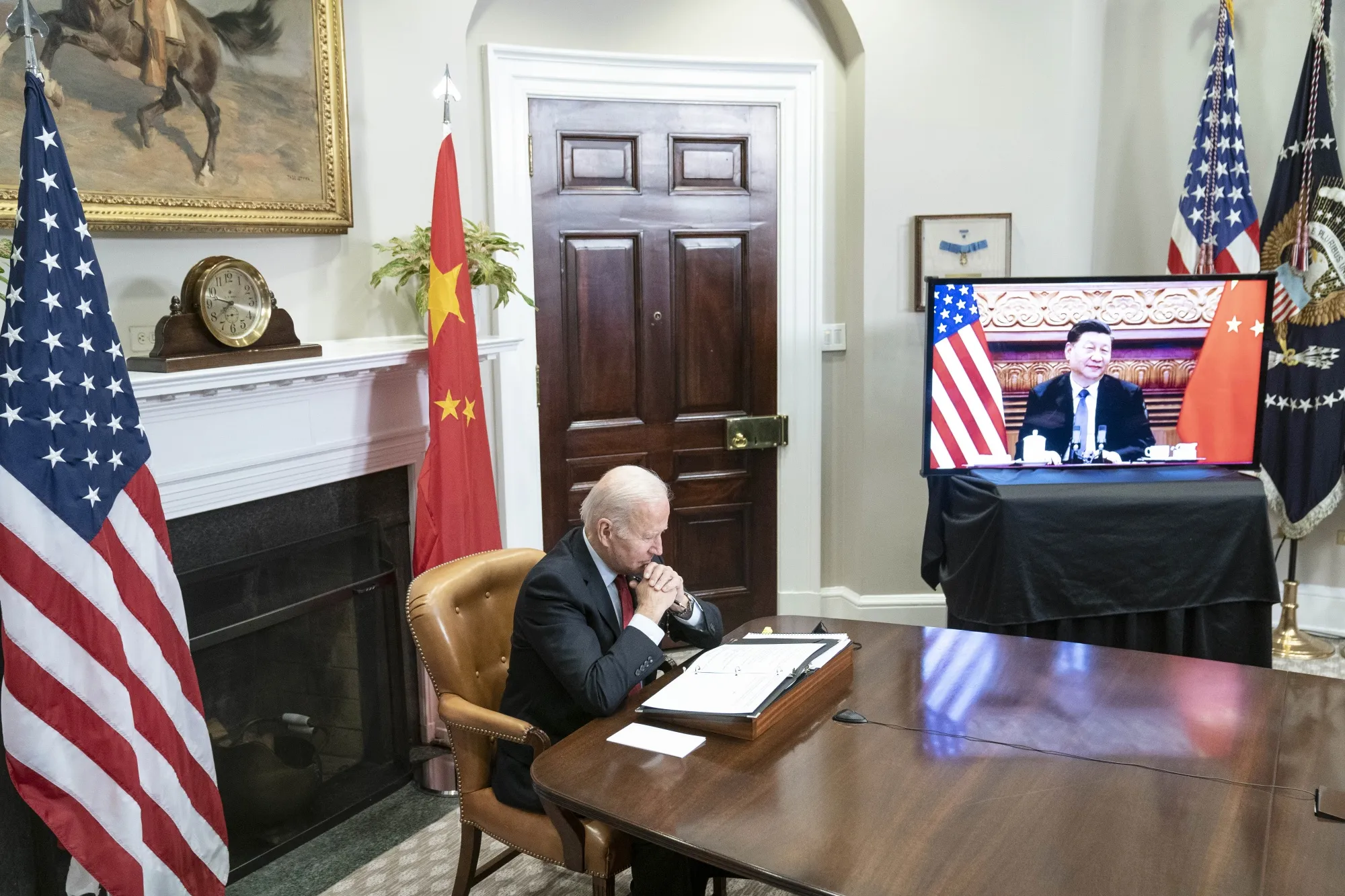 U.S. President Joe Biden listens while meeting virtually with Xi Jinping, China's president, in the Roosevelt Room of the White House in Washington, D.C., on Nov. 15.