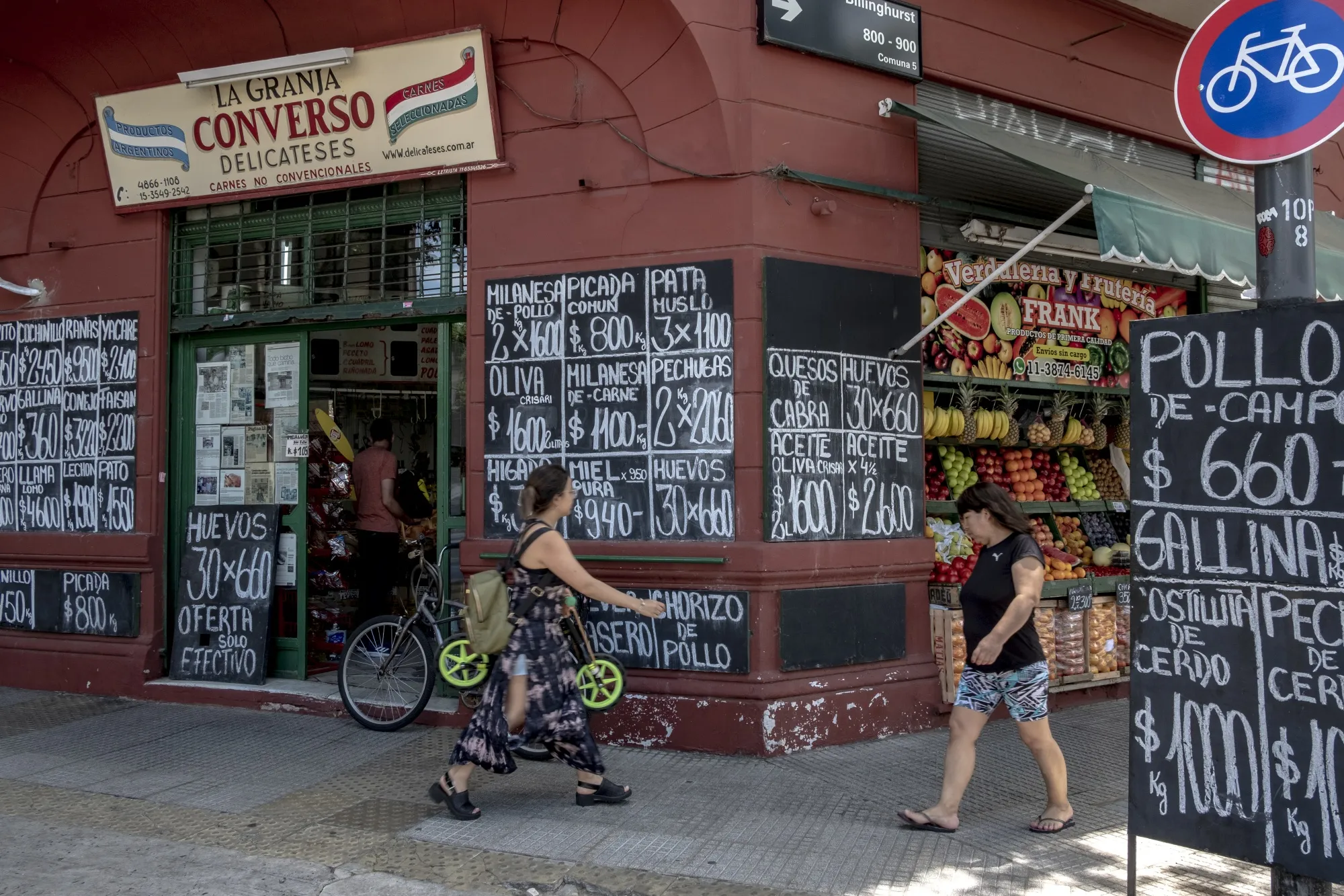 Signs with food prices outside a grocery store in Buenos Aires, Argentina, on Friday, Nov. 18, 2022.&nbsp;