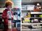 Ozzie Gooen, a programmer, mixes a batch of Soylent, a meal-replacement product (left). The communal refrigerator (right).