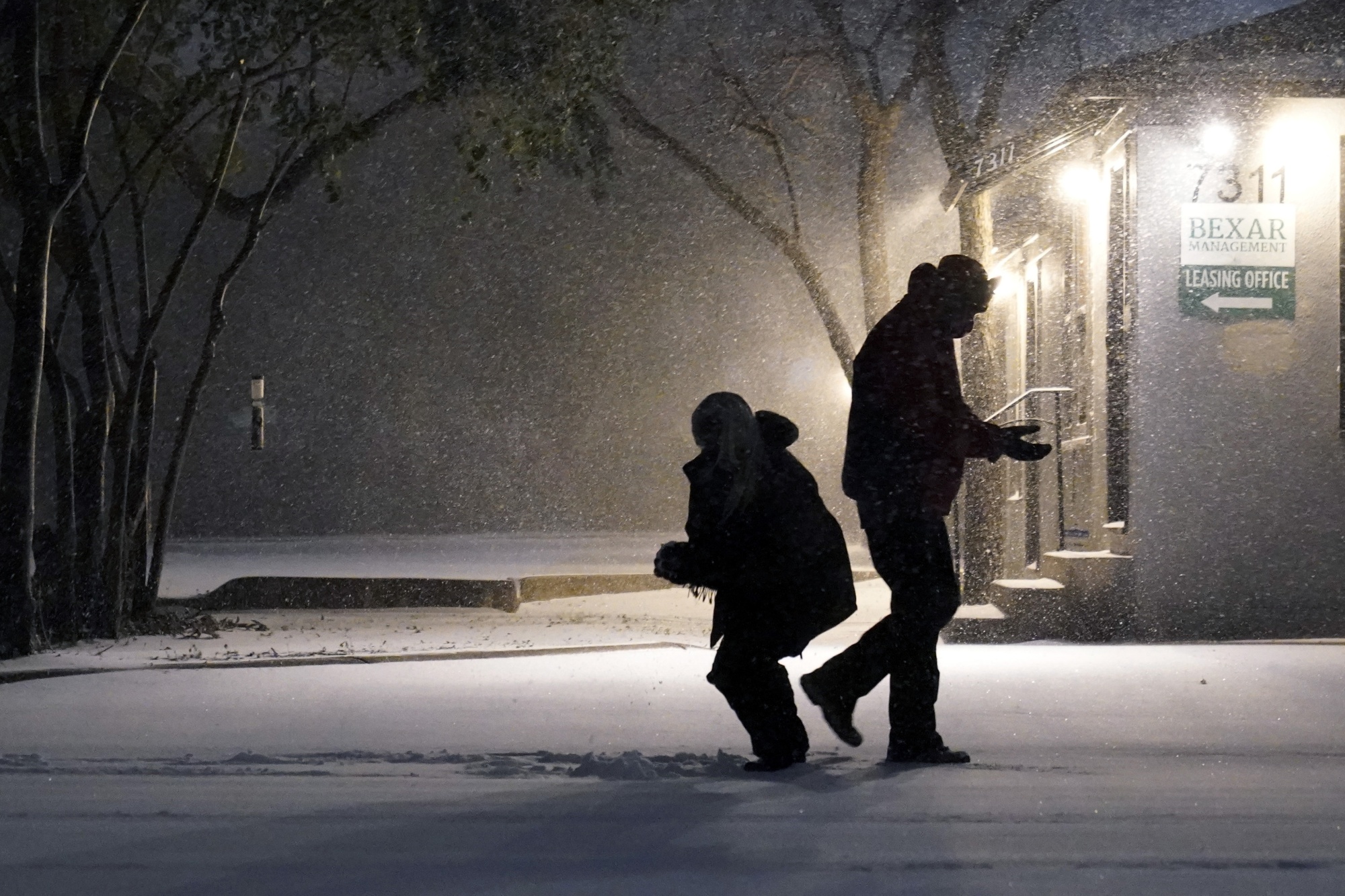 People play in the snow in San Antonio, on&nbsp;Feb. 14.