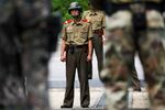 A North Korean soldier, center, looks towards the South Korean side of the truce village of Panmunjom in the Demilitarized Zone (DMZ).