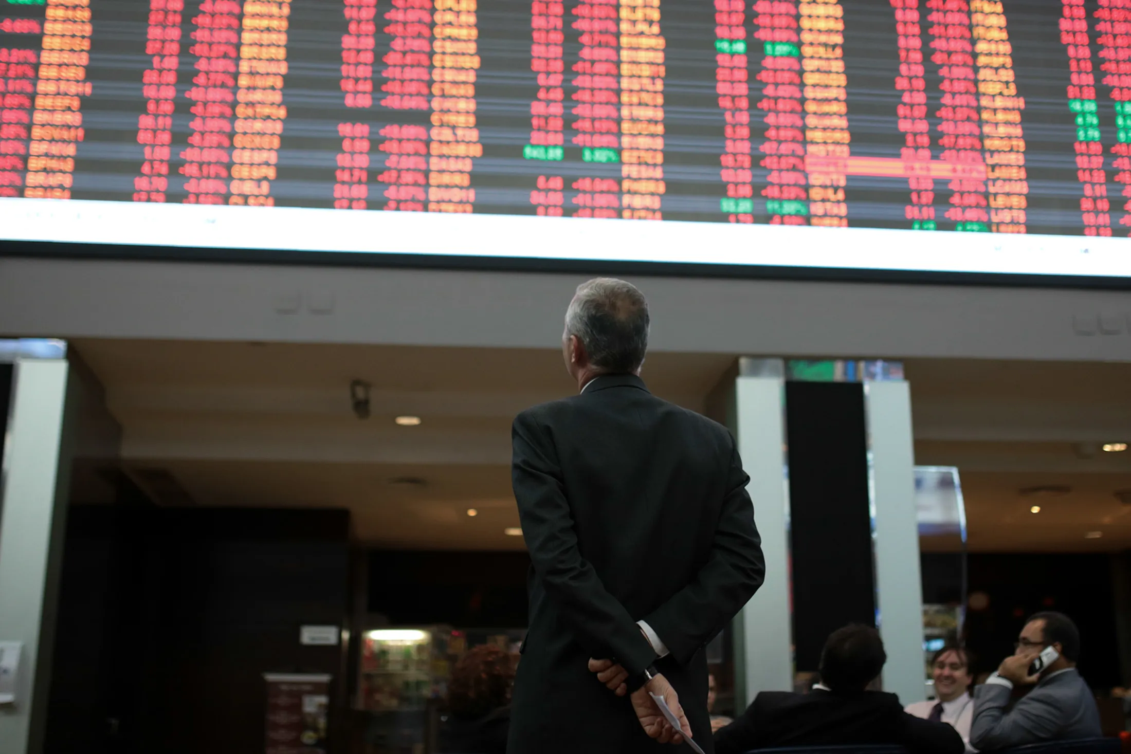 A visitor views the electronic board&nbsp;at the Brasil Bolsa Bacao&nbsp;stock exchange in Sao Paulo, Brazil.