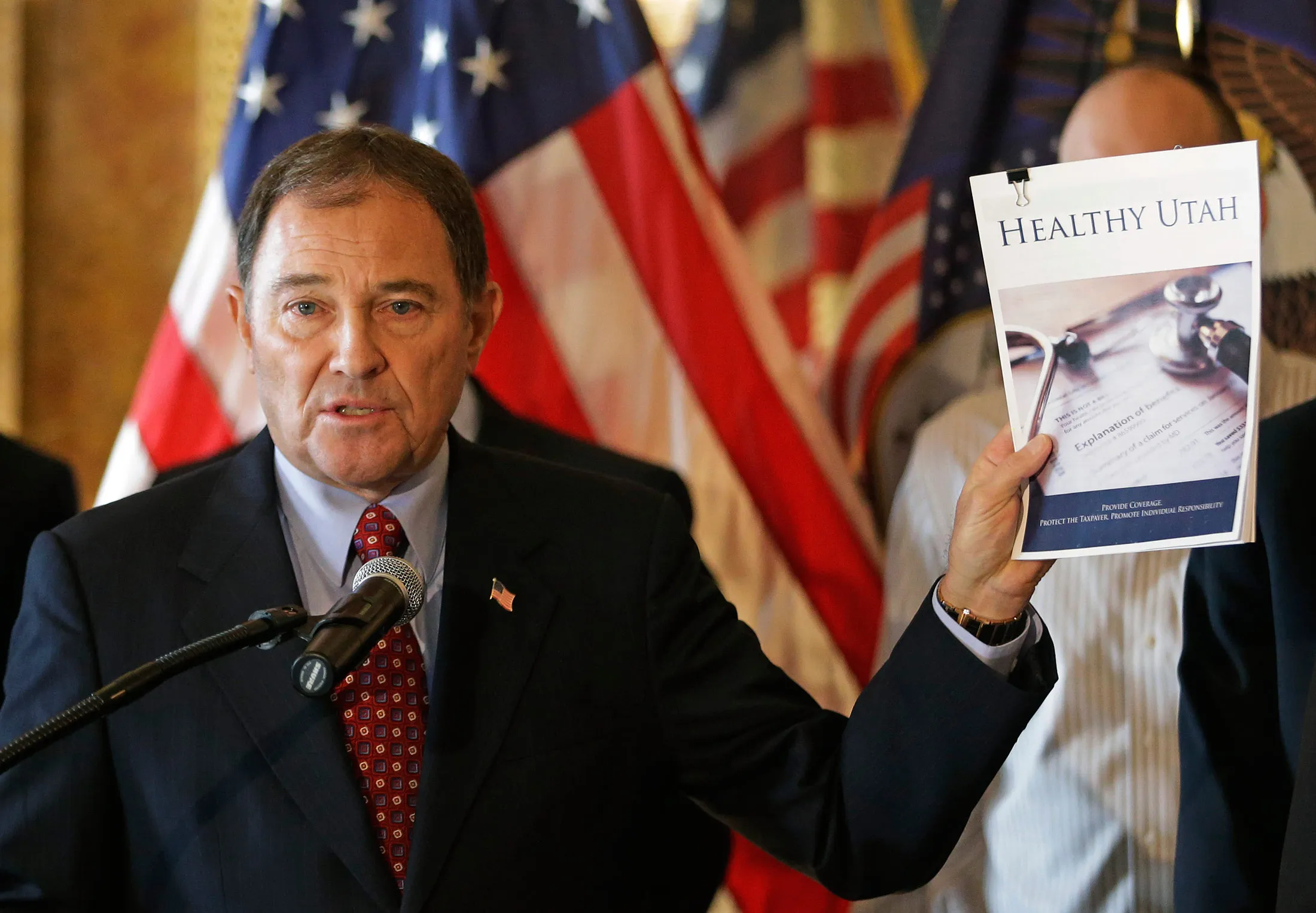 In this Dec. 4, 2014, file photo, Utah Gov. Gary Herbert speaks during a news conference unveiling details about his alternative to expanding eligibility for Medicaid in Utah, in Salt Lake City.

