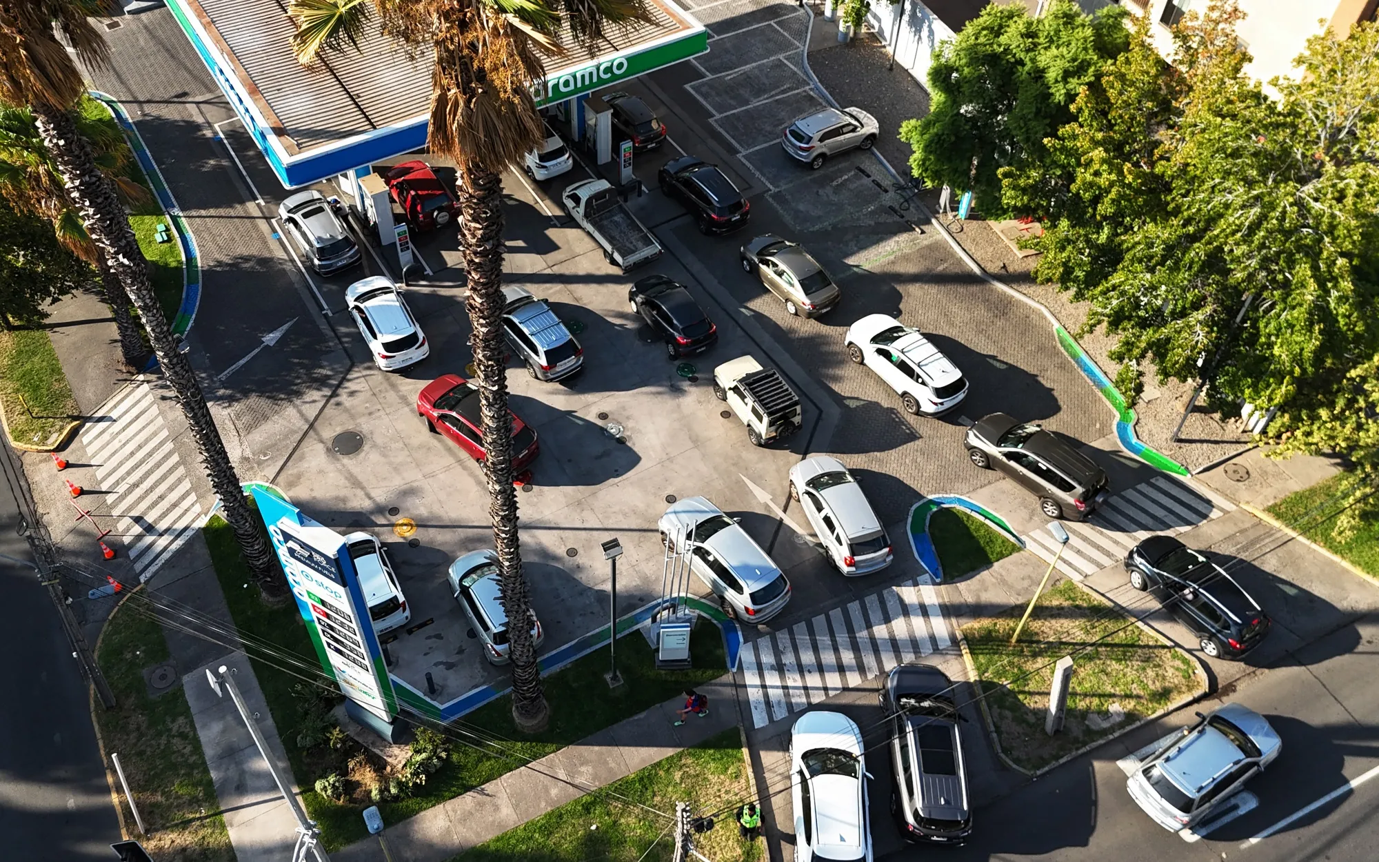 Motorists queue at a gas station in Santiago in March.