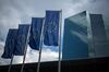 The stars of the European Union (EU) sit on banners flying outside the European Central Bank (ECB) headquarters stands in Frankfur.