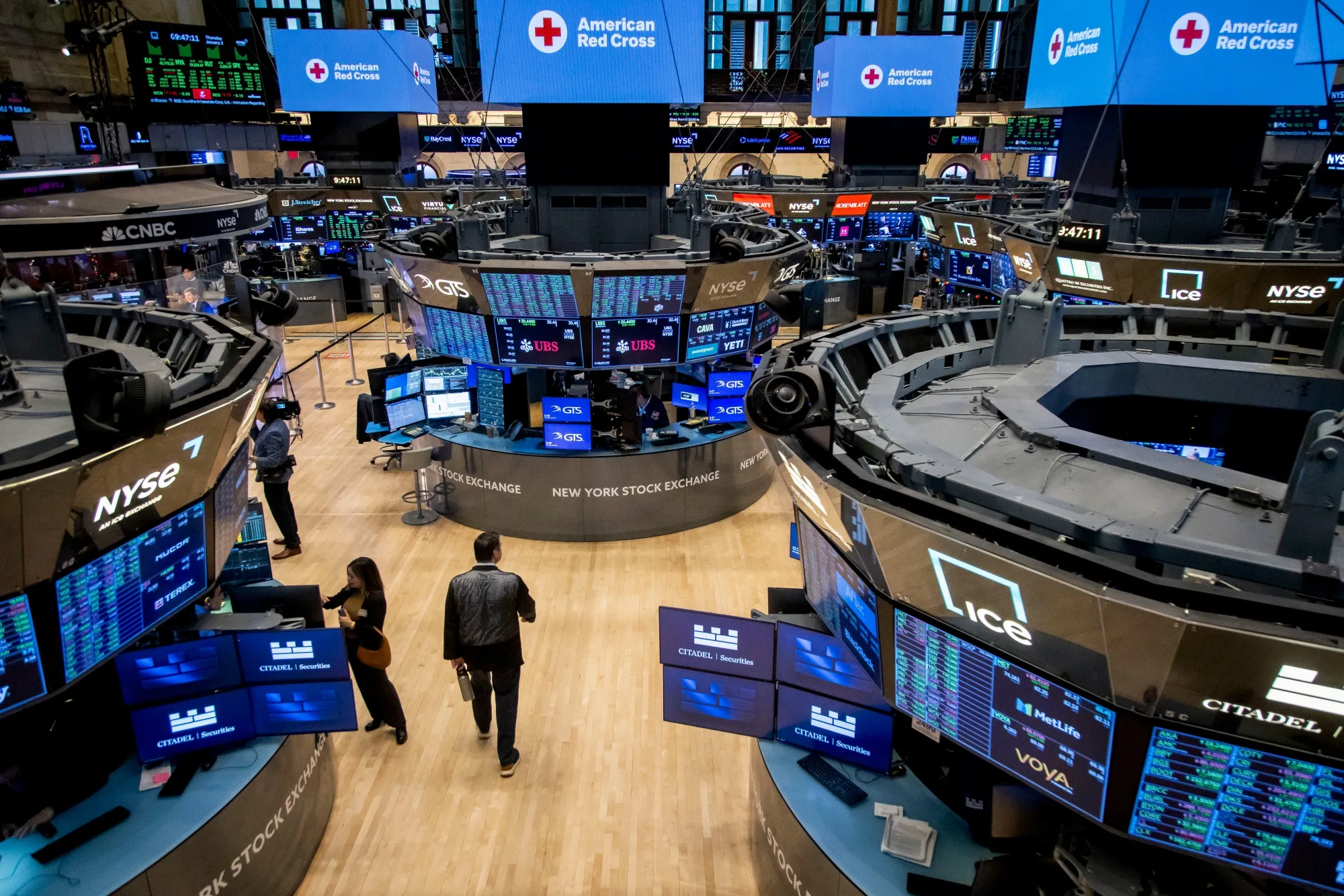 Traders work on the floor of the New York Stock Exchange on Jan. 2.