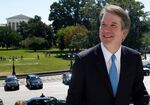 With the U.S. Supreme Court building in the background, Supreme Court nominee judge Brett Kavanaugh arrives prior to meeting with Senate Majority Leader Mitch McConnell on Capitol Hill in Washington.