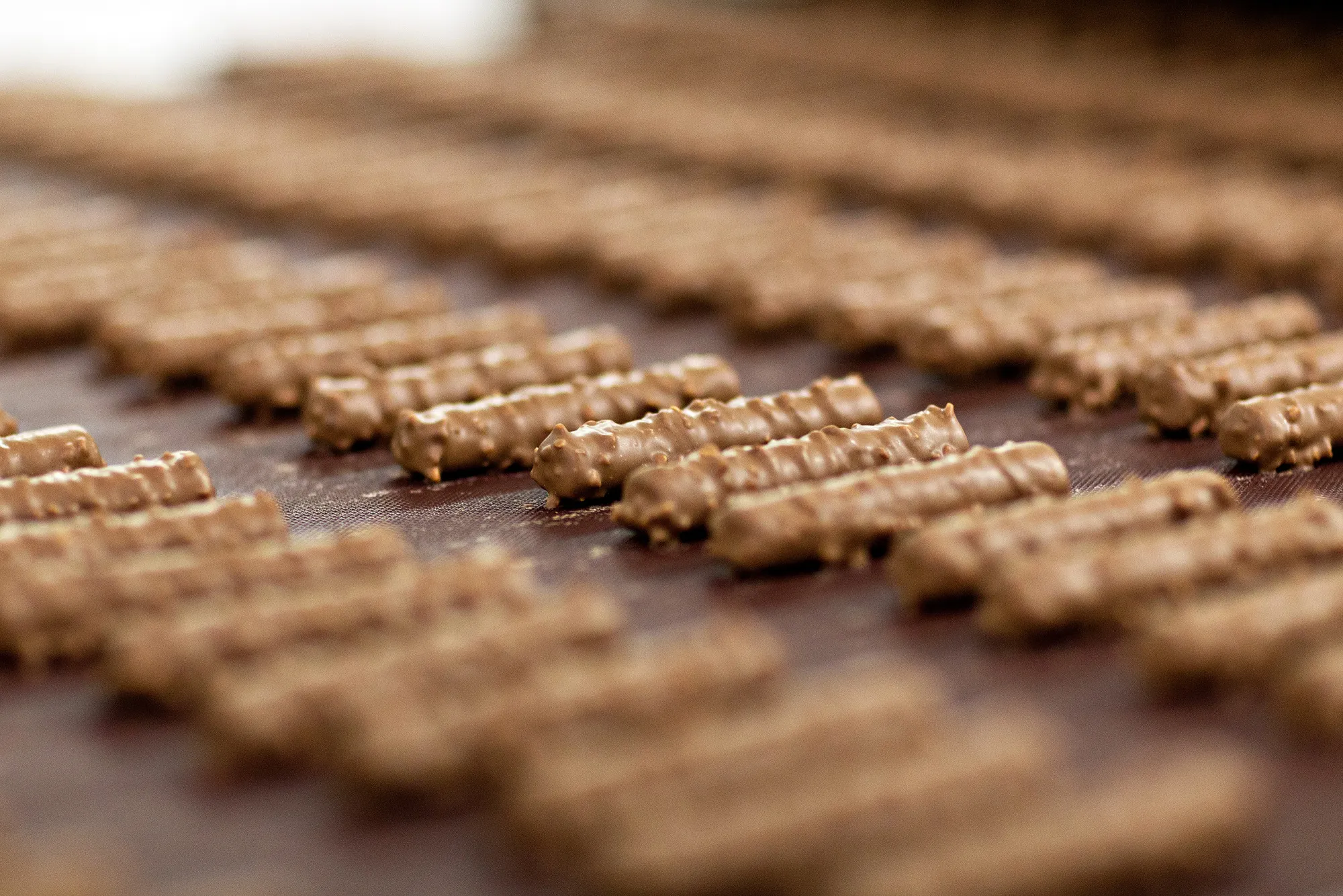Spending on items like chocolate has fallen as consumers face a cost-of-living crisis.