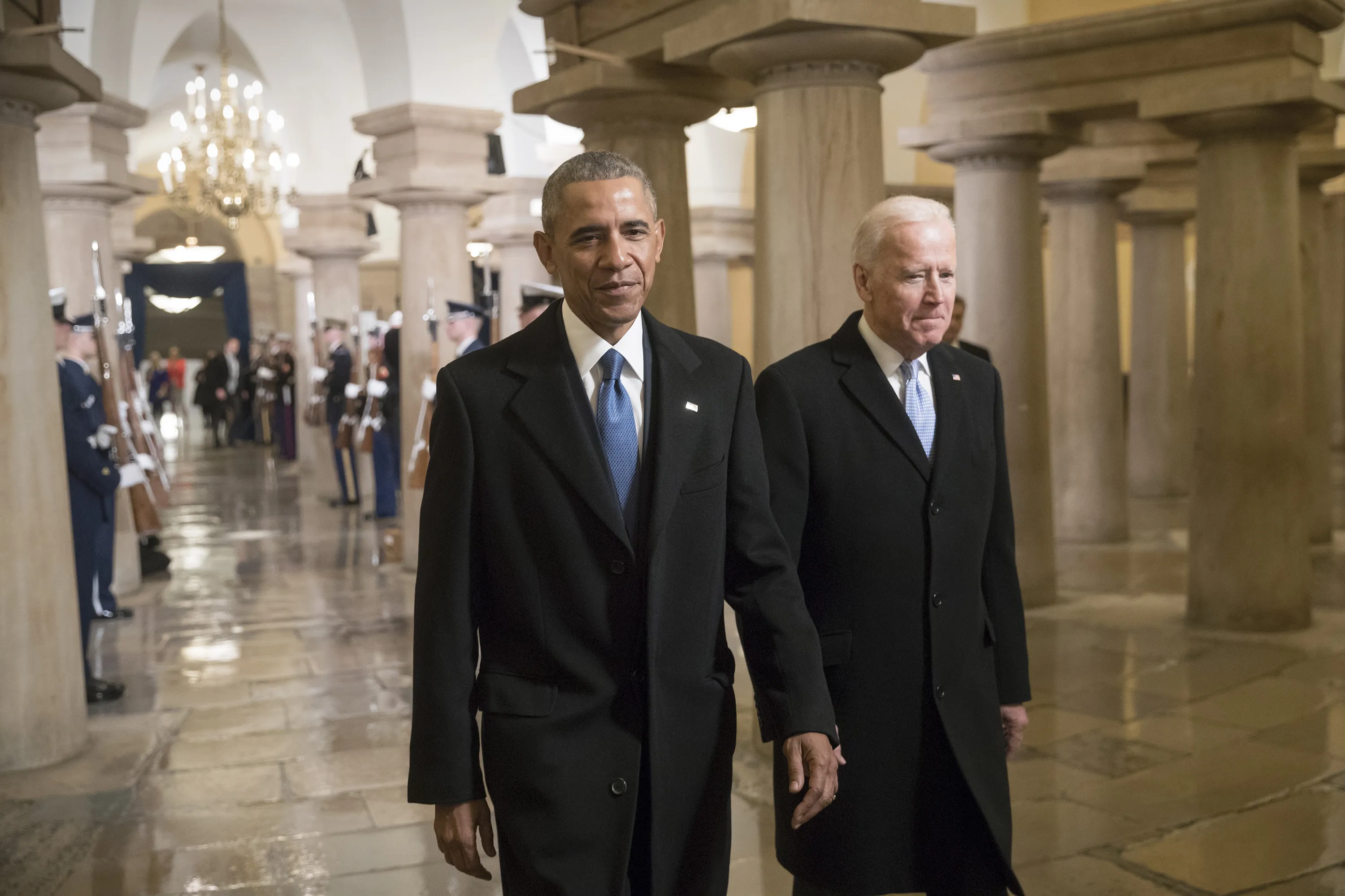 Barack Obama and Joe Biden walk through the Crypt of the Capitol for Donald Trump's inauguration ceremony, in Washington, D.C., on Jan, 20, 2017.