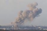 Smoke rises following Israeli air strikes in Gaza on Dec. 6.