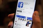 Facebook App And Logo As Crisis Reignites Washington Scrutiny Of Social Networks