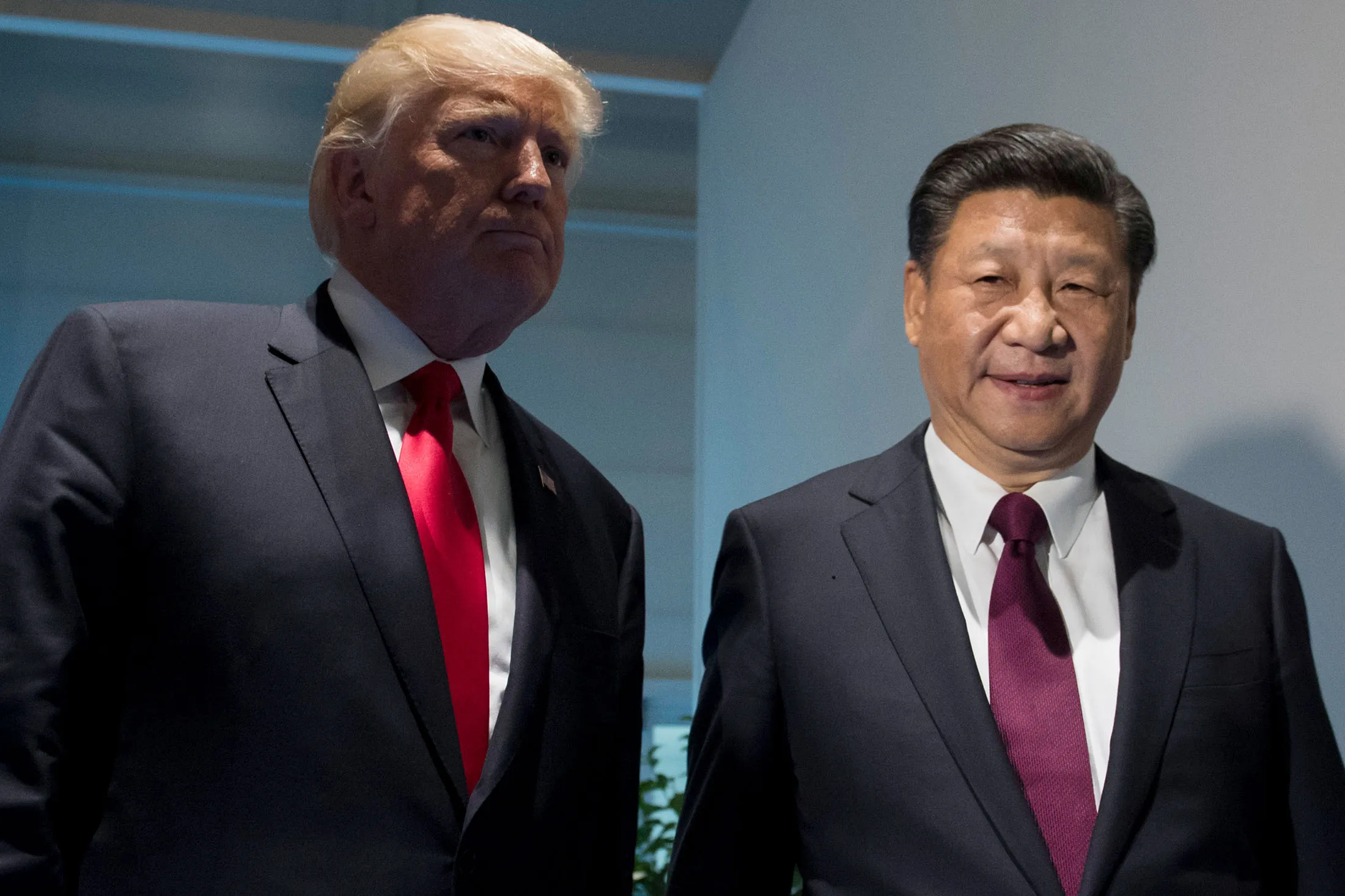U.S. President Donald Trump and Chinese President Xi Jinping arrive prior to a meeting on the sidelines of the G20 Summit in July.
