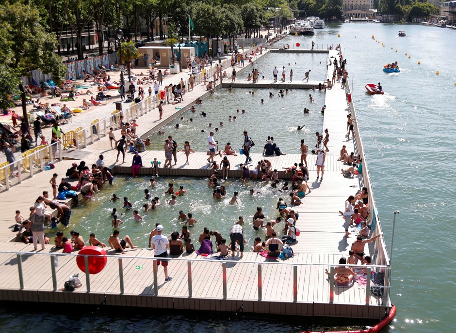 Parisians pack the three pools in the city's once-fetid Bassin de la Villette. 