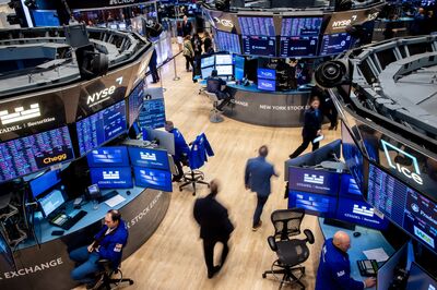 Traders On The Floor Of The NYSE As US Stocks Fall With Trade War Worries Overshadowing Slower Inflation
