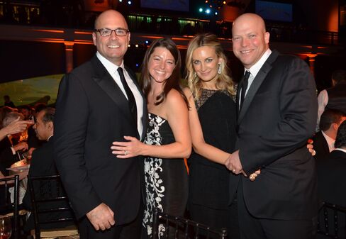 Roberto and Allison Mignone with Melissa and Keith Meister