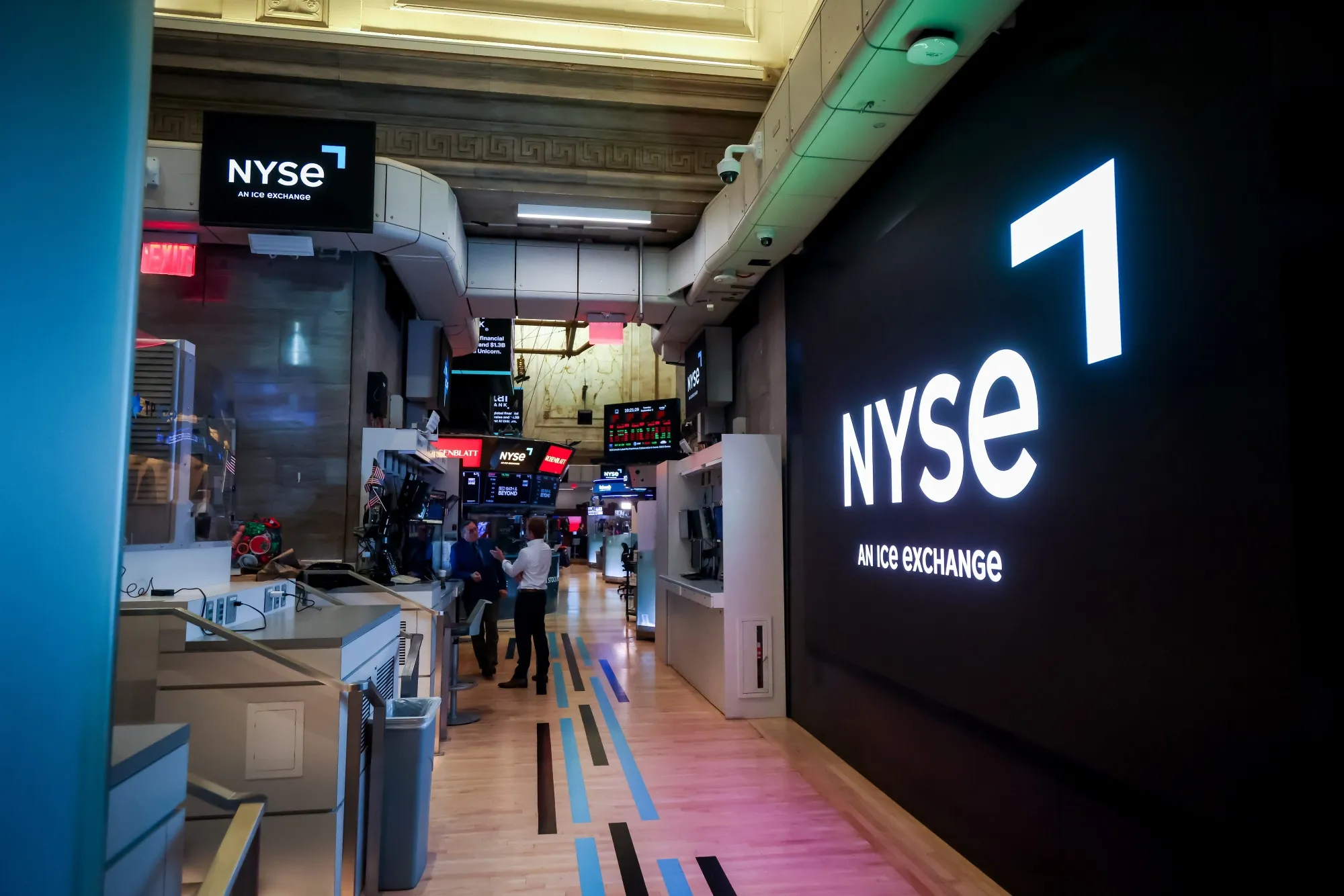 Traders work on the floor at the New York Stock Exchange.