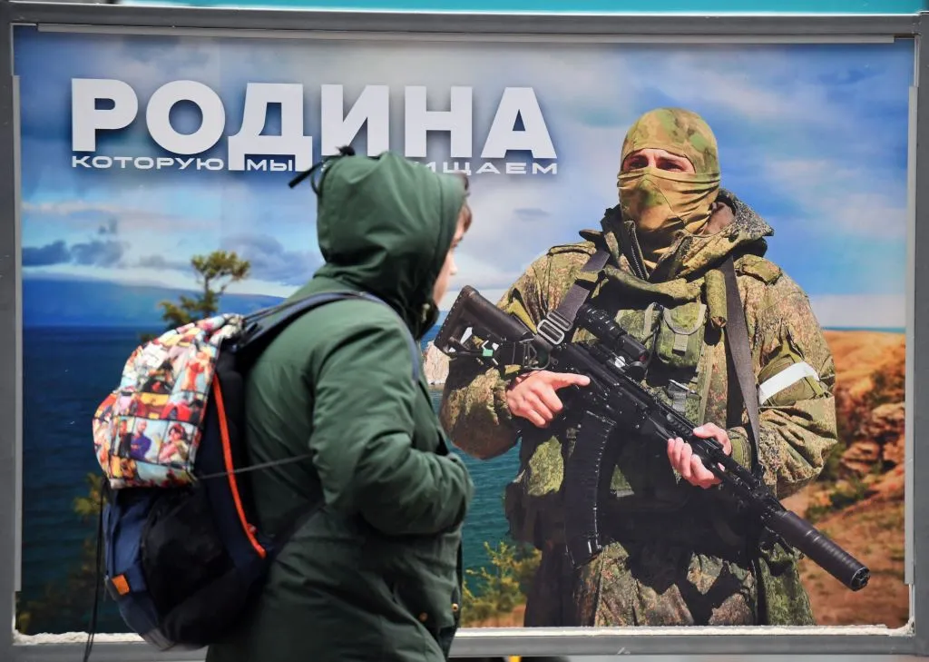 "The Motherland we defend" on&nbsp;a military poster.
