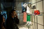 Shoppers outside a Prada store in Hong Kong.