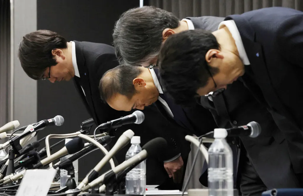 Kobayashi Pharmaceutical Co. President Akihiro Kobayashi&nbsp;and others bow&nbsp;at the beginning of a news conference&nbsp;in&nbsp;March.