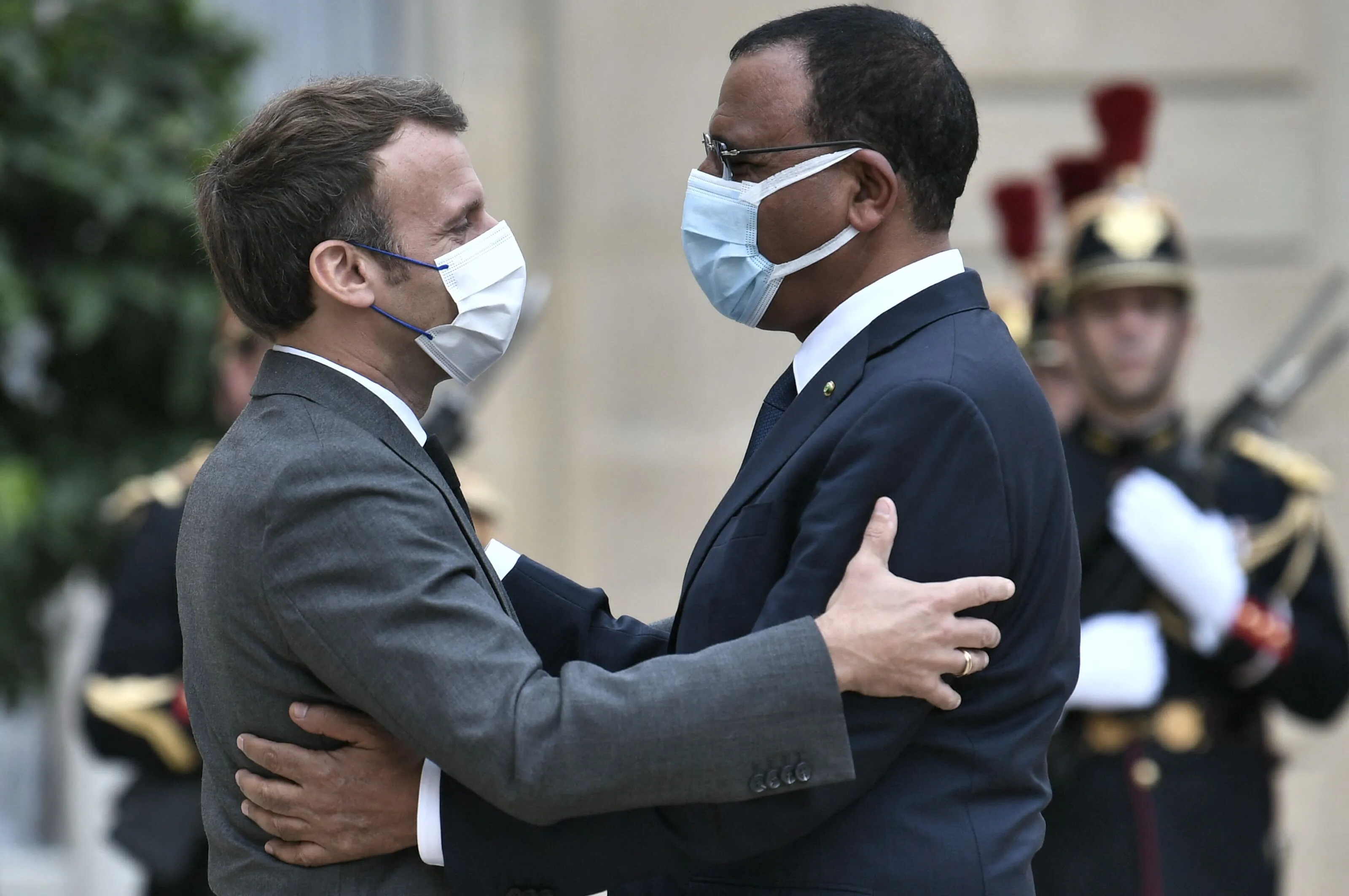 Emmanuel Macron, left, welcomes Mohamed Bazoum&nbsp;upon his arrival at the Elysee presidential Palace in Paris, on July 9.