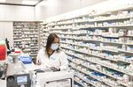 A pharmacist's assistant works at a Rexall pharmacy in Toronto, Ontario, Canada, on Friday, April 30, 2021.