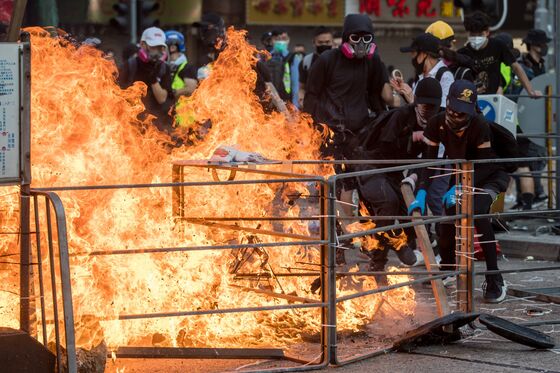 Protester Shot in H.K. on China’s National Day: Hong Kong Update