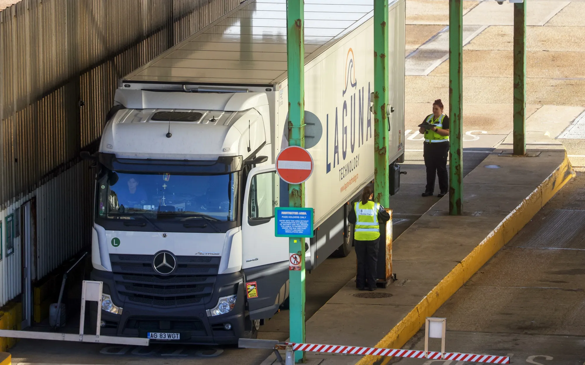 Border force police inspect a haulage truck at the Port of Dover Ltd. in Dover, U.K.