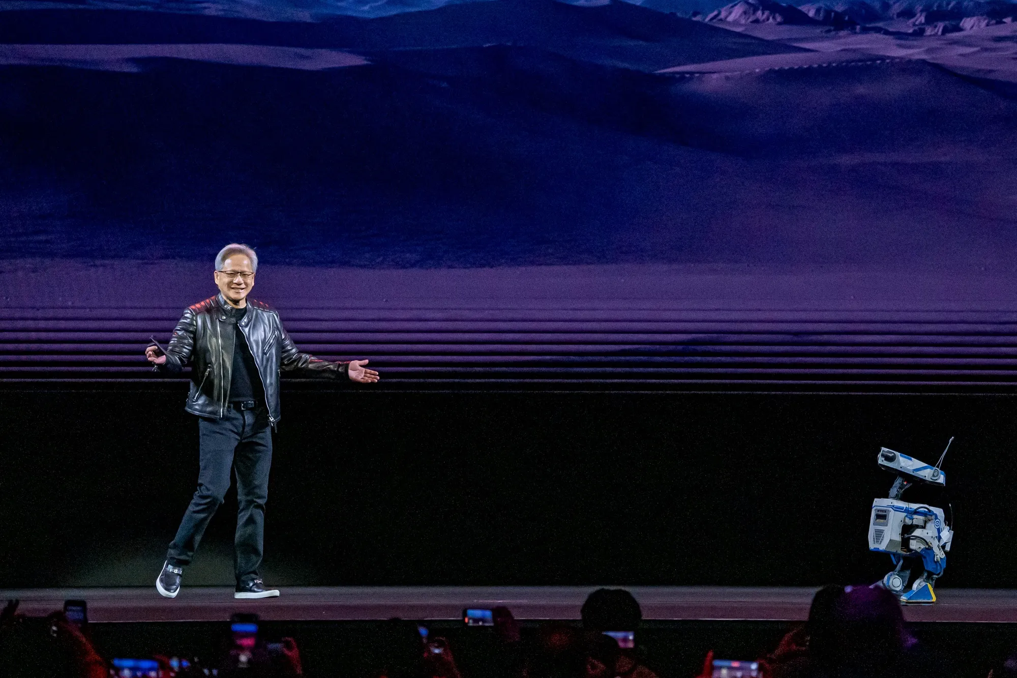 Nvidia’s Jensen Huang and his&nbsp;new robot, "Blue," during the company’s&nbsp;conference on March 18 in San Jose, California.