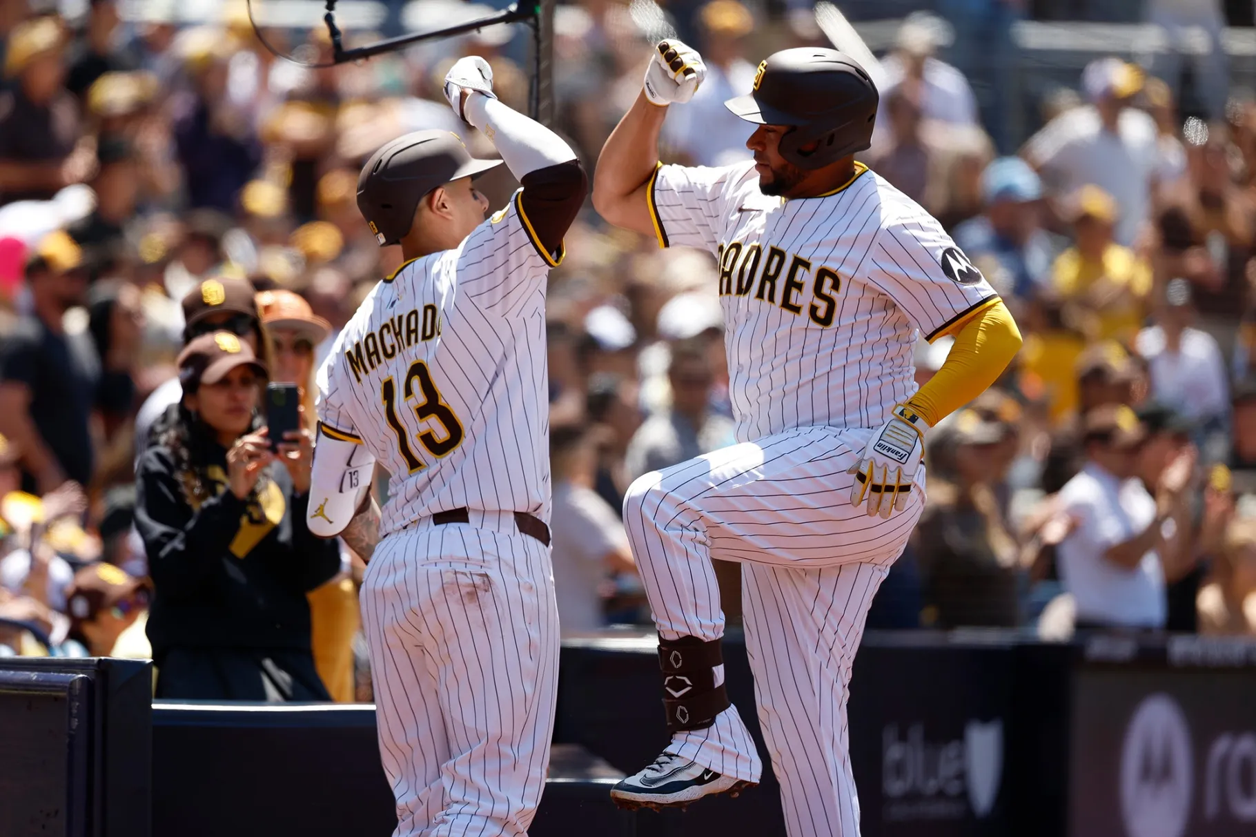 San Diego Padres players celebrate&nbsp;after&nbsp;a home run during a game against the San Francisco Giants at Petco Park in San Diego.