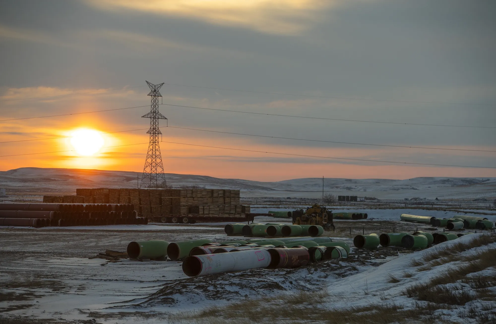 Pipes for the Keystone XL pipeline sit stacked in a yard near Oyen, Alberta on Jan. 26.
