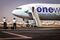 Pilots take photographs on their phones after they disembarked a plane headed for a storage facility after it arrived at Alice Springs Airport