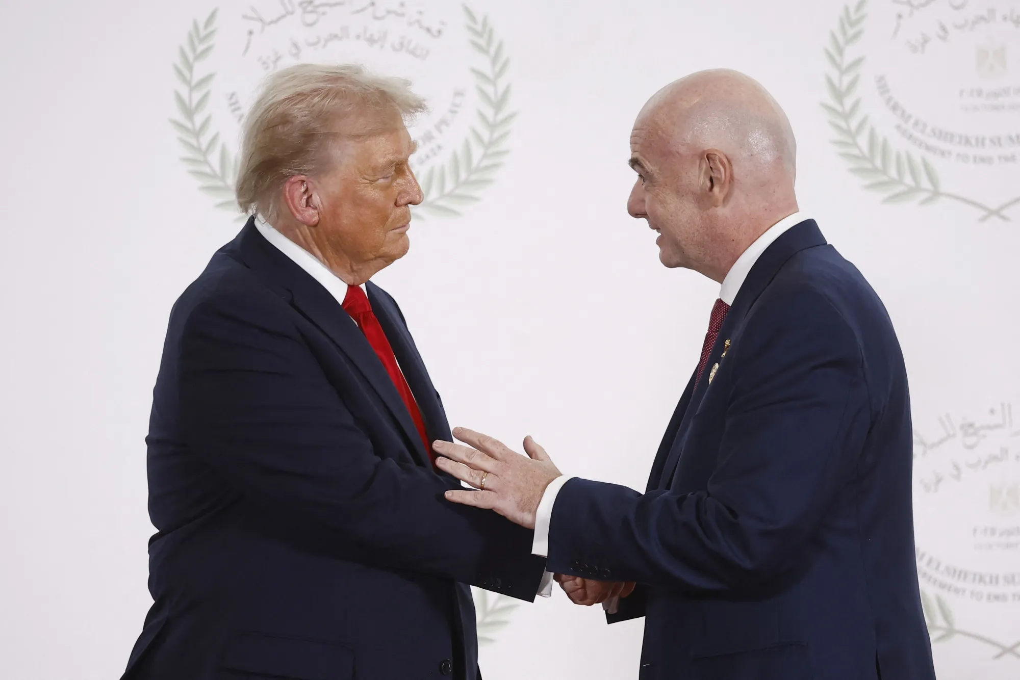 US President Donald Trump greets FIFA President Gianni Infantino during a summit on Gaza in Sharm el-Sheikh, Egypt&nbsp;on Oct. 13.&nbsp;