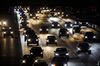 Vehicles drive in traffic down the 405 freeway at night in Inglewood, California, U.S., on Thursday, Sept. 19, 2019. The Trump administration moved to strip California of its authority to limit greenhouse gas emissions from vehicles, even as it warned the state it needs to do more to combat smog.