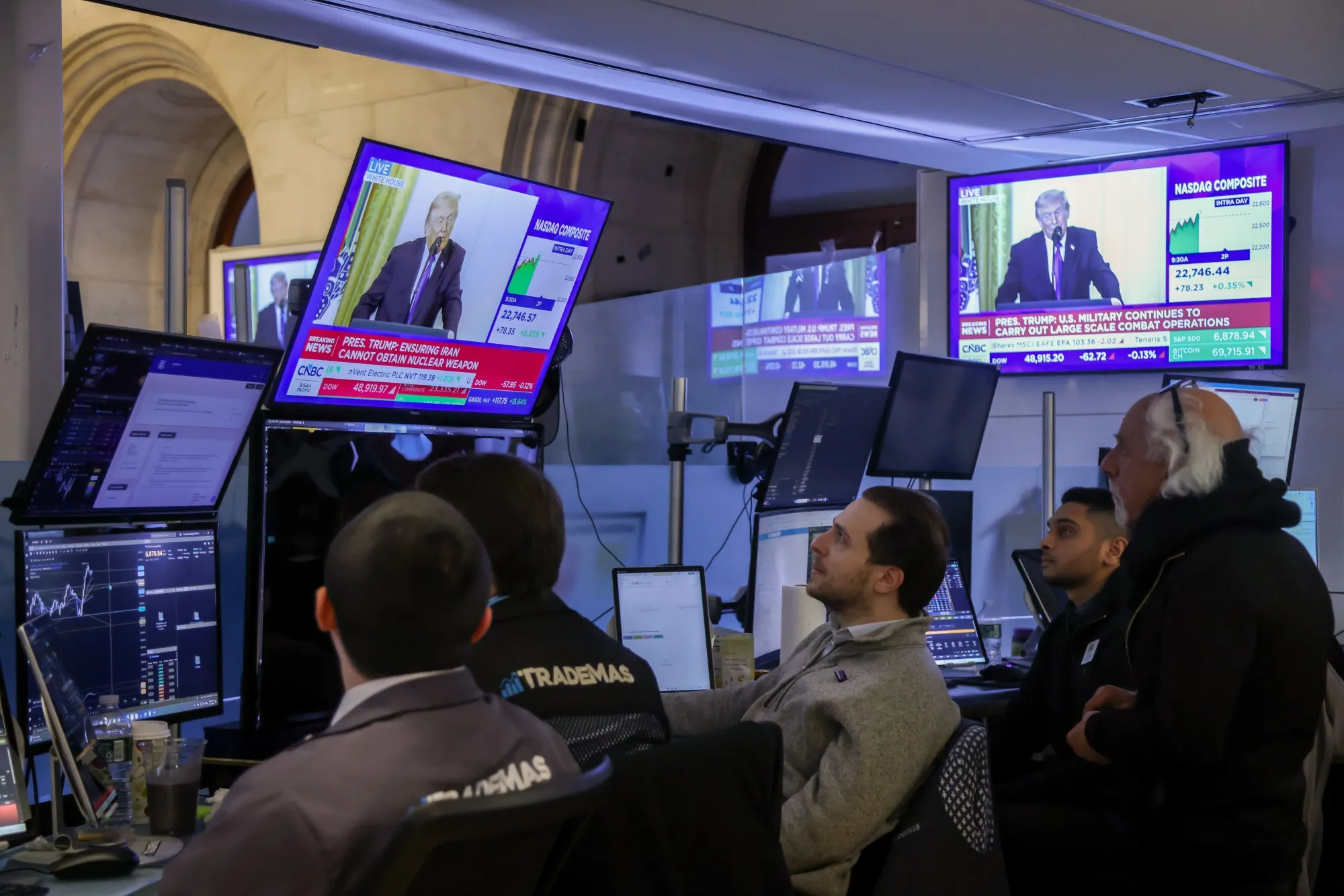 A television station broadcasts US President Trump on the floor of the New York Stock Exchange (NYSE) in New York on March 2.