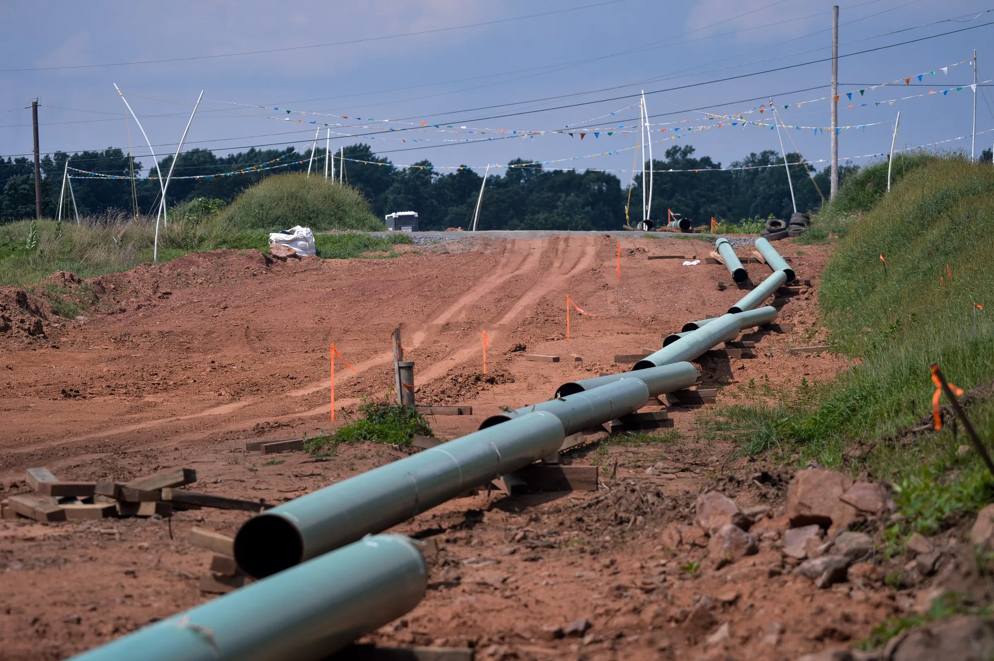 Sections of pipe at an Energy Transfer Partners LP construction site for a&nbsp;natural gas liquids pipeline.