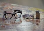 Items auctioned by Oscar winning actor Michael Caine included a gold Rolex and his eyeglasses.
