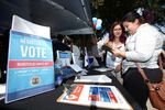 A new voter registers in Los Angeles in September. 
