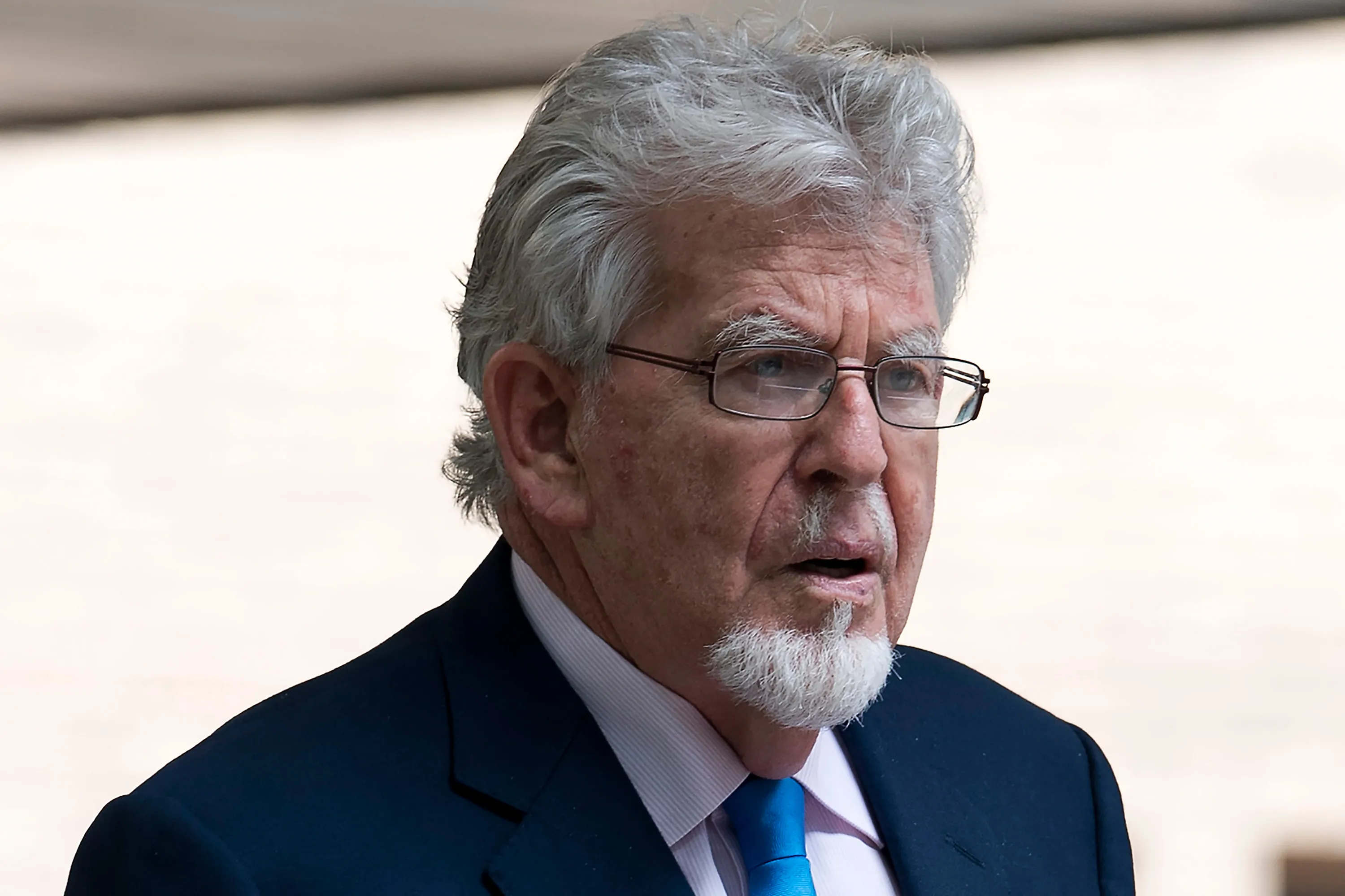 Australian entertainer Rolf Harris leaves Southwark Crown Court in London on May 30, 2017. Harris had been accused of four counts of indecent assault against three teenage girls between 1971 and 1983. He was found not guilty of the charges, with prosecutors saying they would not seek a retrial. / AFP PHOTO / Justin TALLIS (Photo credit should read JUSTIN TALLIS/AFP via Getty Images)