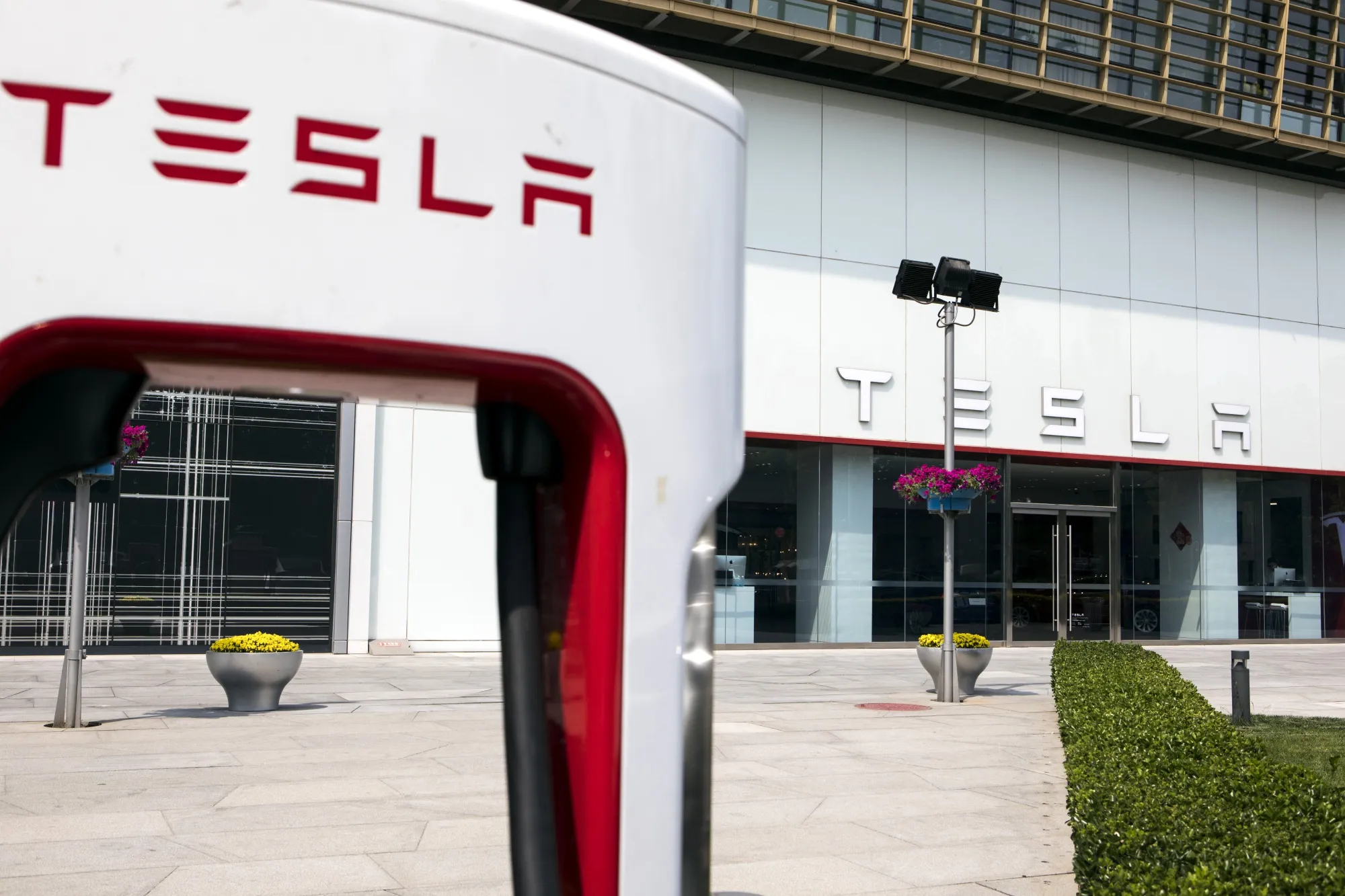 Tesla Showroom as China Vows to Retaliate Following U.S. Tariff Hike