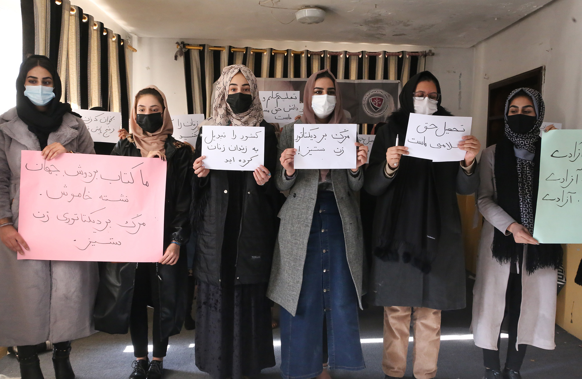 Afghanistan University Ban: Men Stand In Support Of Women After Taliban ...