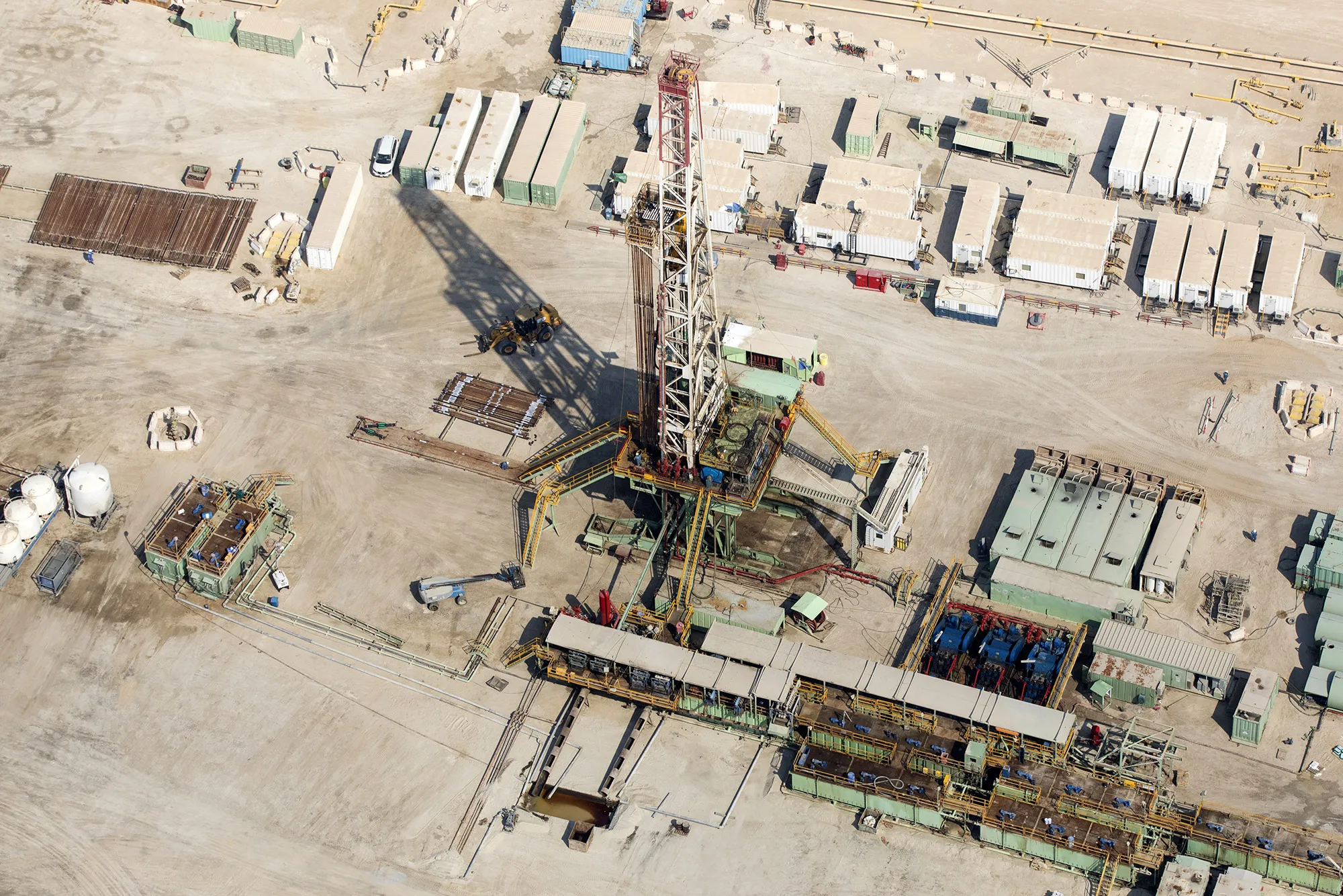 An oil drilling rig stands operated by Saudi Aramco, in Manifa, Saudi Arabia.